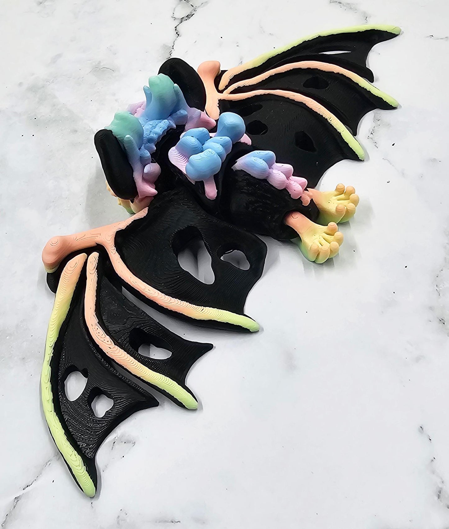 Articulated Hollow Bat – 3D Printed Cinderwing3D Design | Flexi Bat Toy in Black & Pastel Rainbow | Cute Spooky Desk Decor