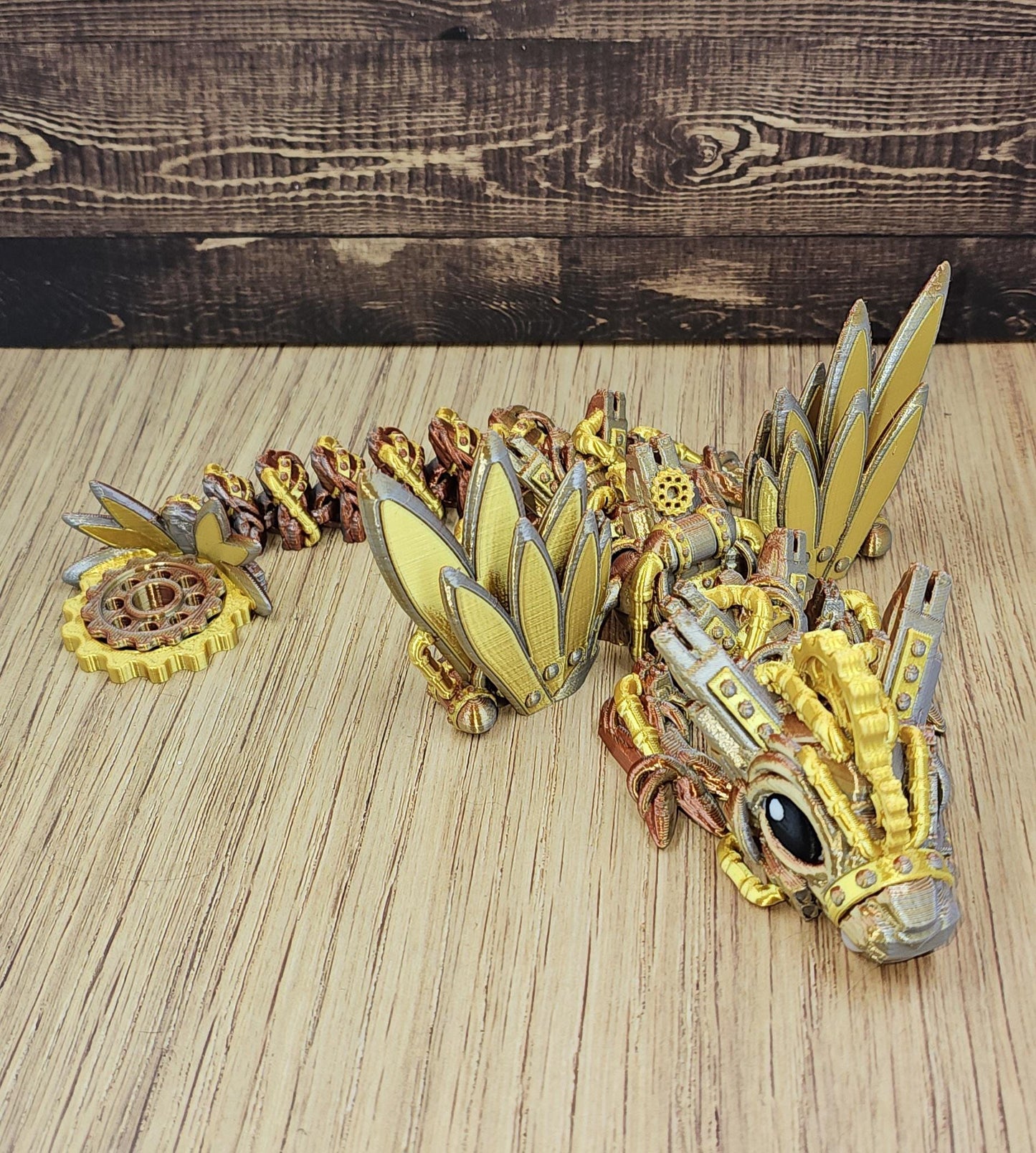 Articulated Steampunk Dragon: Cinderwing3D Tri-Color Filament, Spinning Cog