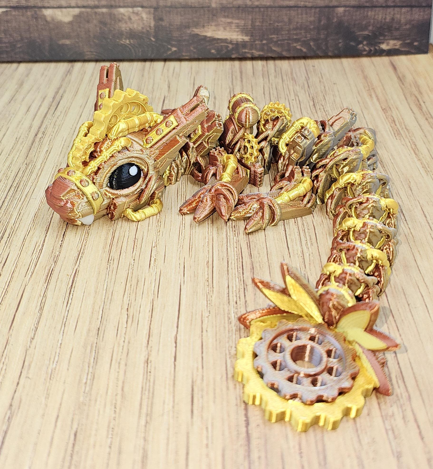 Articulated Steampunk Dragon: Cinderwing3D Tri-Color Filament, Spinning Cog